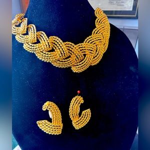 Gold tone choker necklace with matching clip on earrings